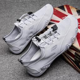 2022 New Mesh Shoes Men's Spring Breathable Men's Shoes Hundred Board Shoes Trend Sports Shoes Men's Flying Weave Casual Shoes