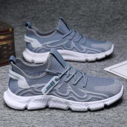 Large -size casual shoes 2022 summer new flying woven breathable running shoe net Korean men's sports shoes