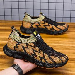 Men's shoes 2022 spring new fashion flying weaving men's shoes breathable youth running shoes casual sports shoes