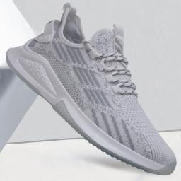 Men's sneakers 2022 spring new lightweight shoes flying woven and breathable casual tide shoes Soft sole men's single shoes