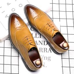 Spring And Autumn Bollock Men's Shoes Business Casual Breathable Shoes Fashion Carved New Leather Shoes
